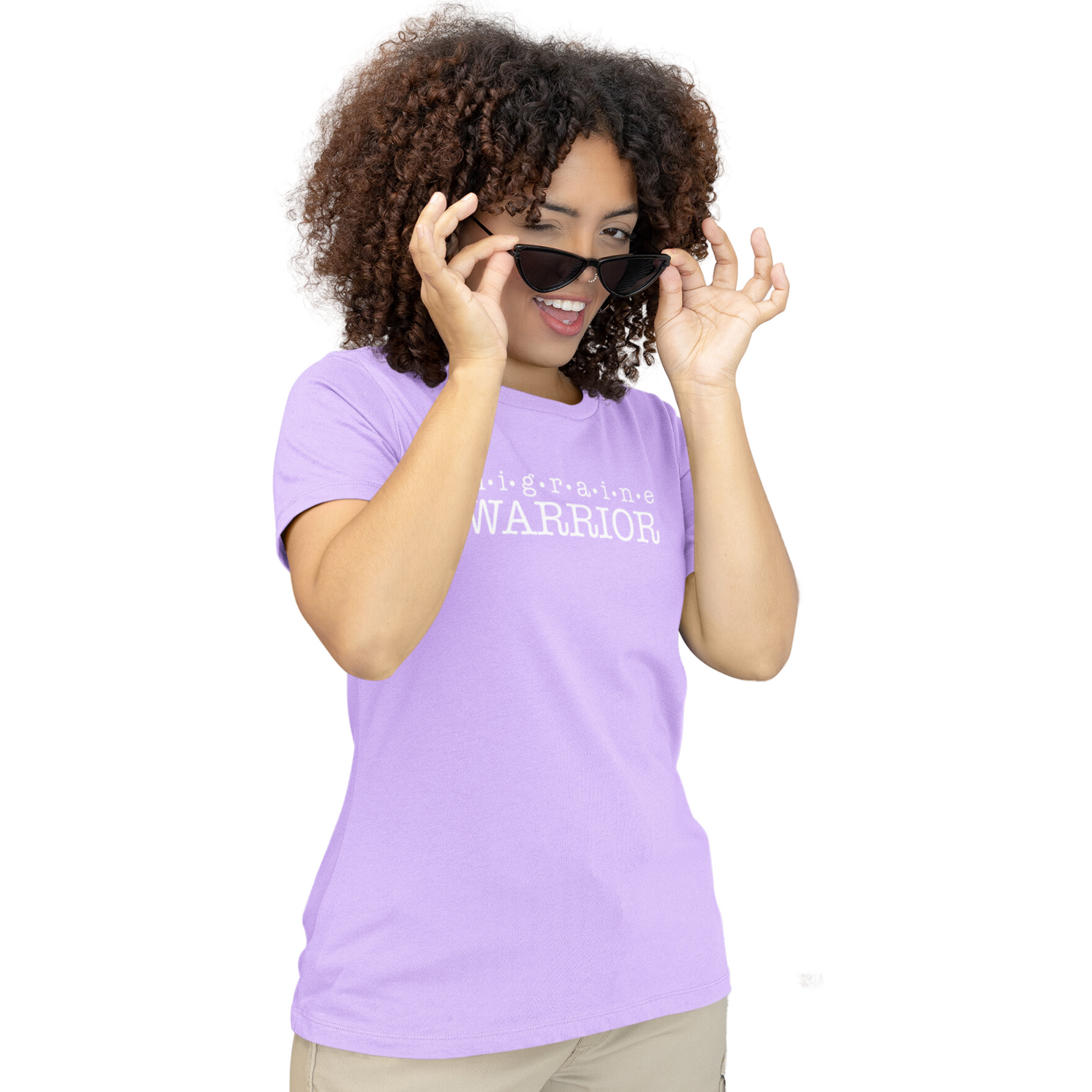 Girl with curly hair wearing sunglasses with a lavender migraine warrior t-shirt